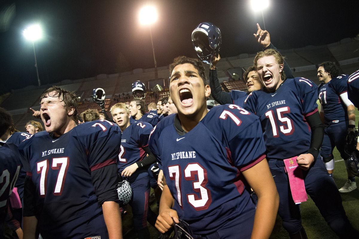 Mt. Spokane celebrates their 7-0 win over Shadle Park, Thurs., Oct. 20, 2016, at Joe Albi Stadium. The game remained scoreless until Mt. Spokane's Sam Spears scored the only touchdown of the night. (Colin Mulvany / The Spokesman-Review)