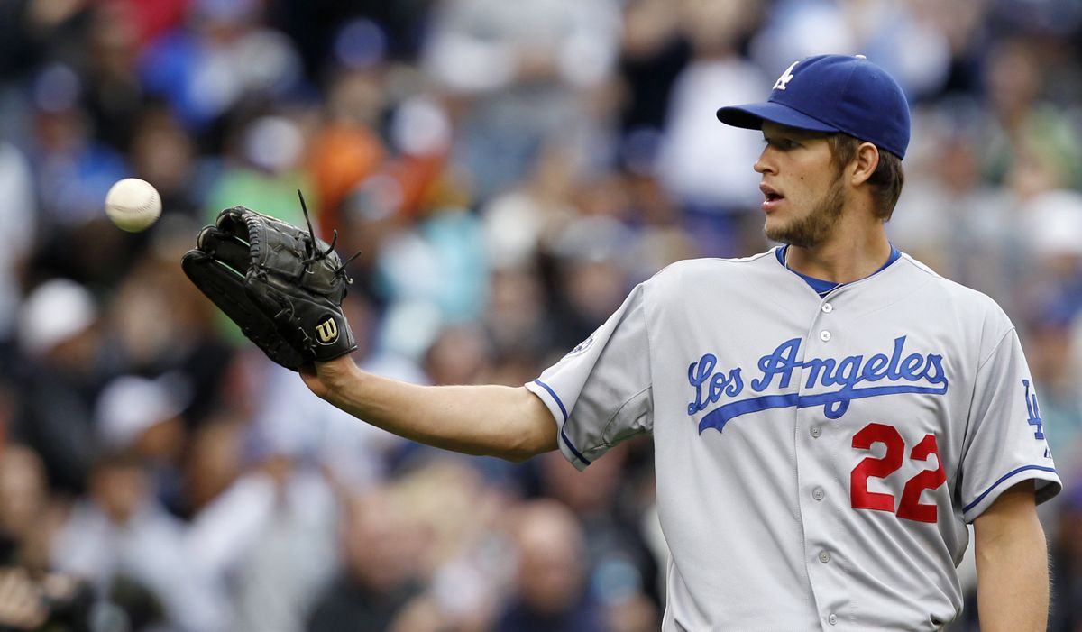 Dodgers starting pitcher Clayton Kershaw struck out 14 Mariners in Los Angeles victory at Safeco Field. (Associated Press)