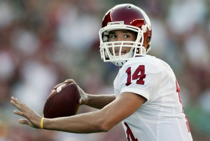 FILE - In this Sept. 13, 2008 file photo, Oklahoma quarterback Sam Bradford looks for a receiver against Washington during an NCAA college football game in Seattle. Bradford  was selected as the No. 1 overall pick by the St. Louis Rams in the first round of the NFL Draft on Thursday, April 22, 2010. (John Froschauer / Associated Press)