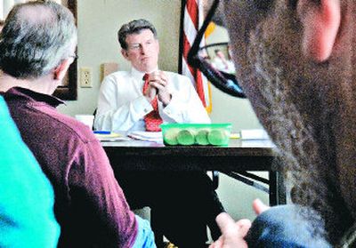 
 Gov. Butch Otter listens to comments during a meeting at Bonners Ferry City Hall on Tuesday. The visit is part of the Capitol for a Day program where he visits towns throughout the state, allowing residents to  voice their concerns or ideas. 
 (Kathy Plonka / The Spokesman-Review)