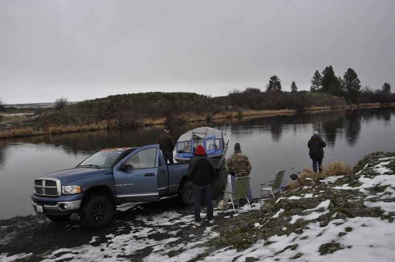 The boat launch is undeveloped and rough at Rock Lake in Whitman County, but boaters with four-wheel drive rigs manage to launch. (Rich Landers)