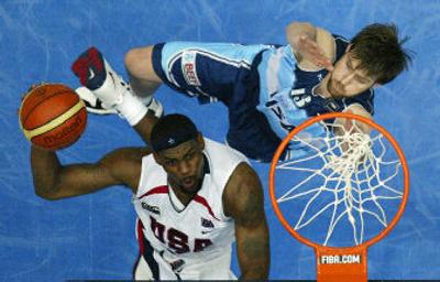 
USA's LeBron James goes up for a shot as Argentina's Andres Nocioni tries to defend on Saturday.
 (Associated Press / The Spokesman-Review)