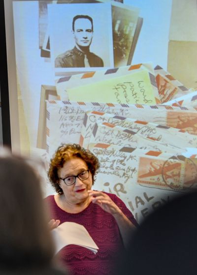 Clarice Wilsey, daughter of Dachau concentration liberation Dr. Captain David Wilsey, M.D., talks to a group at Gonzaga University on Friday as part of the ongoing holocaust exhibit this fall.  (KATHY PLONKA/THE SPOKESMAN-REVIE)
