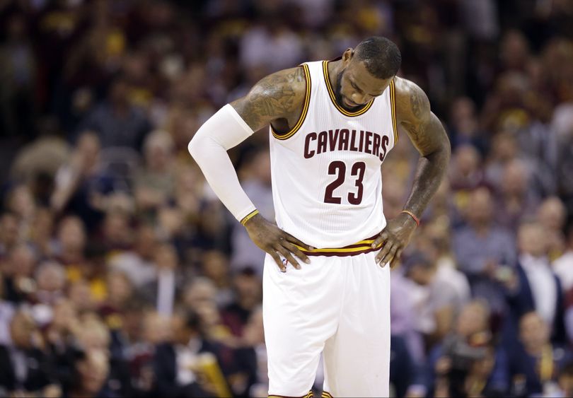 Cleveland Cavaliers forward LeBron James hangs his head during the second half of Game 6 on Tuesday in Cleveland. (AP)