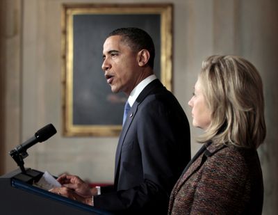 President Barack Obama with Secretary of State Hillary Rodham Clinton delivers a statement on Libya on Wednesday. (Associated Press)