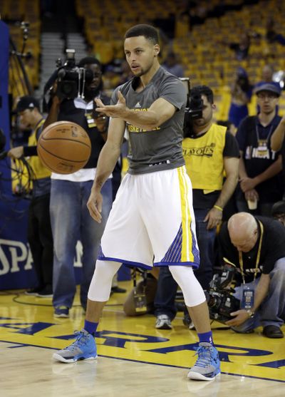 Golden State Warriors stars Stephen Curry expects to return Sunday after missing two playoff games. (Ben Margot / Associated Press)