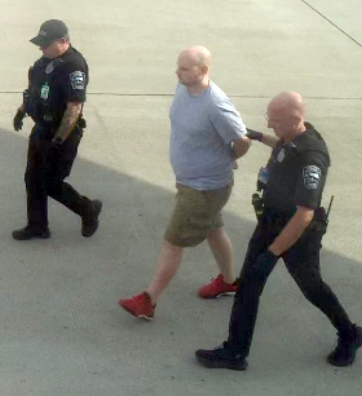 A first class passenger arrested at Spokane International Airport on Wednesday evening handed a flight attendant a note indicating he had a bomb and would detonate it if the plane was not diverted from Seattle, according to federal court documents.  (Courtesy Scott Mackie)