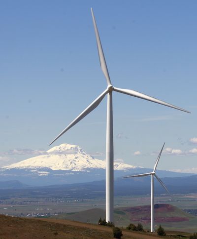 FILE - This June 3, 2011 file photo shows wind turbines on the Columbia Gorge near Goldendale, Wash.  Officials said Tuesday that the fate of a tax credit that advocates say is needed to maintain tens of thousands of wind energy jobs will be decided during high-stakes, last-minute negotiations between President Obama and House Republicans over fiscal issues. (Rick Bowmer / Associated Press)