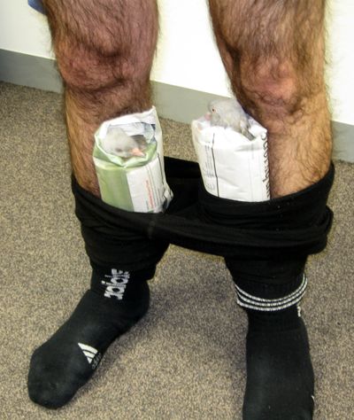 ORG XMIT: MEL101 In this Feb. 1, 2009 photo released by the Australian Customs Service, the legs of an Australian man who was caught with two pigeons hidden in his pants on an international flight from Dubai to Melbourne, Australia, are shown. The 23-year-old man arrived in Melbourne on Sunday, Feb. 1, 2009 and was questioned by Customs officials after two eggs and some seeds were found in a vitamin container in his luggage. A search of his body found two live pigeons wrapped in padded envelopes and held to the man's legs with a pair of tights. (AP Photo/Australian Customs Service, HO) **EDITORIAL USE ONLY, NO SALES** (The Spokesman-Review)