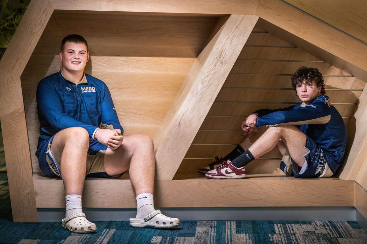 Mead wrestlers Markus Fetcho and Josh Neiwert pose at the Spokane Central Public Library.   (COLIN MULVANY/THE SPOKESMAN-REVI)