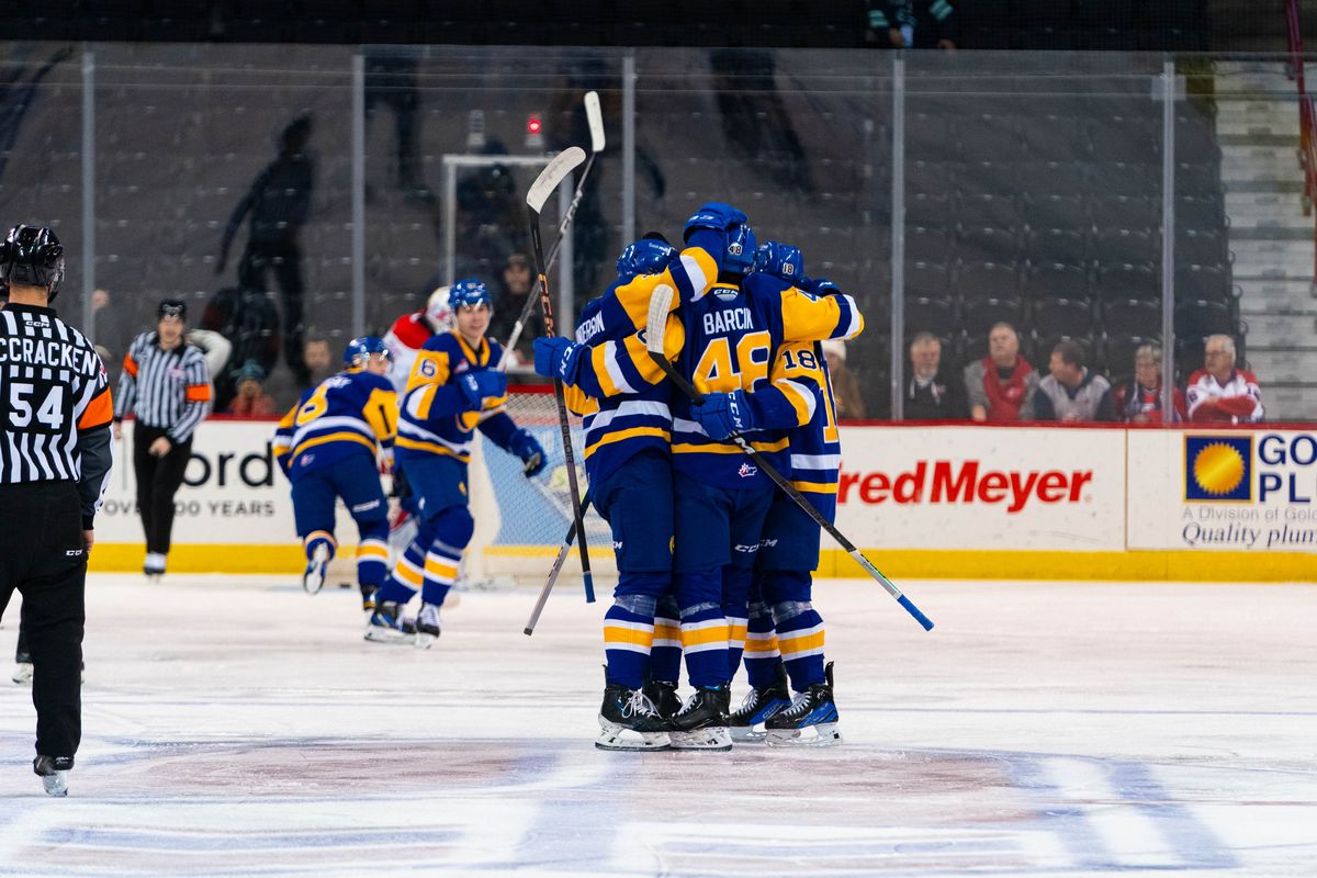 Saskatoon defenseman Samuel Barcik, center, celebrates his first WHL goal against the Spokane Chiefs at the Spokane Arena on Wednesday, Nov. 29, 2023.   (Larry Brunt/Spokane Chiefs)