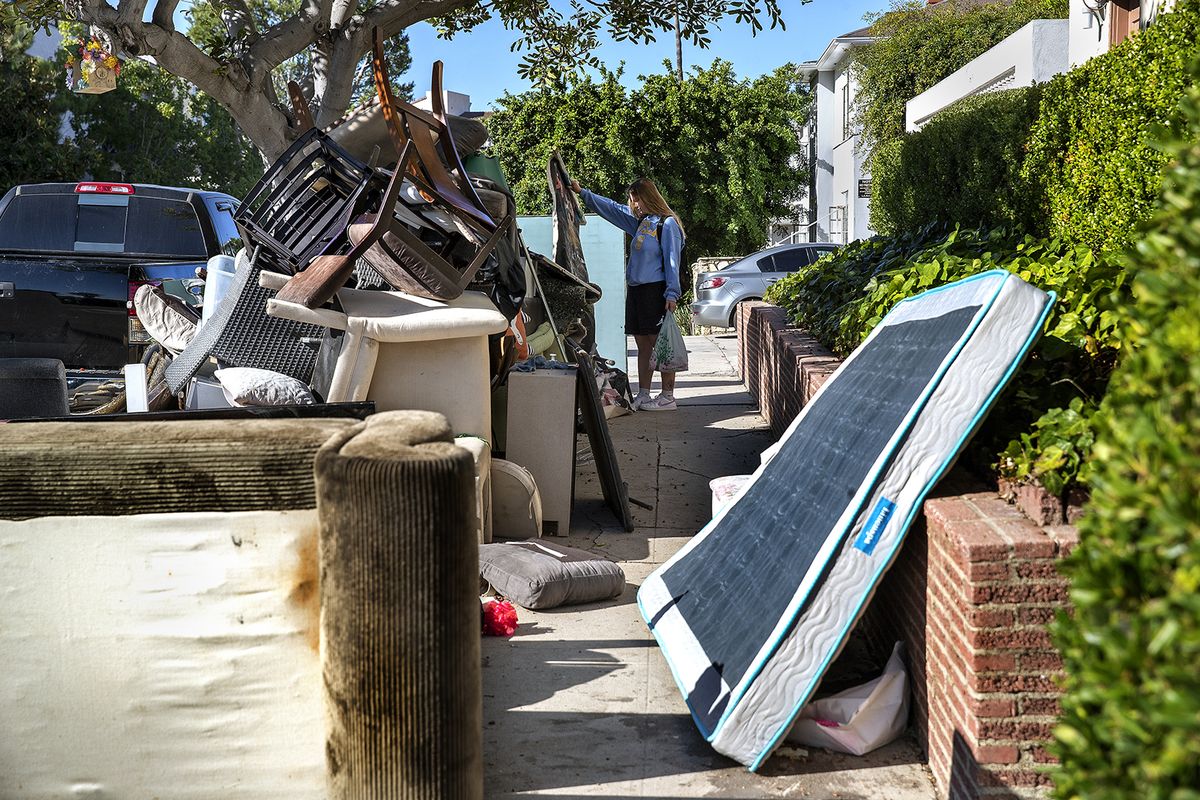Discarded furniture from UCLA students who have just moved out is piled up outside a private apartment building on Roebling Avenue near the campus.    (Mel Melcon/Los Angeles Times/TNS)