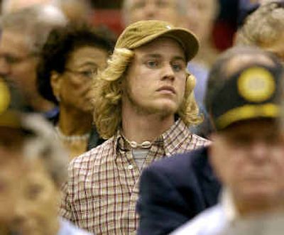 
Mike Payne, 22, sits among a mostly older crowd as he attends a town hall meeting on Social Security last month in Kansas City, Mo. Young people are taking a more active role in the debate over Social Security. 
 (Associated Press / The Spokesman-Review)
