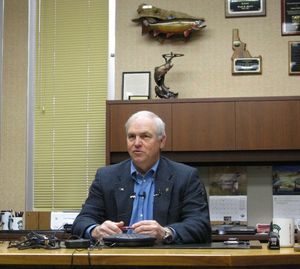 Idaho Fish & Game Director Virgil Moore, at his Boise office, discusses Idaho's plans to gear up for a Lolo Zone wolf kill and a fall wolf-hunting season, as endangered species list protections are lifted from wolves in Idaho on Wednesday. (Betsy Russell)