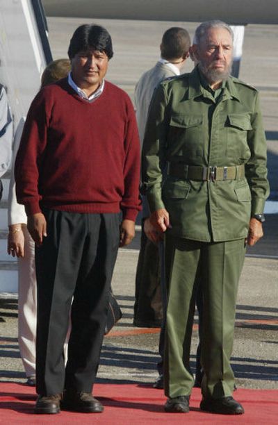 
Cuban President Fidel Castro, right, welcomes Bolivian President-elect Evo Morales on Friday at the Jose Marti International Airport in Havana. 
 (Associated Press / The Spokesman-Review)