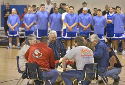 The Shamans of Lapwai stand at attention as the Nomee family drummers open the Spring Fever All-Native Basketball Tournament in Spokane Friday.
(Christopher Anderson/ / The Spokesman-Review)