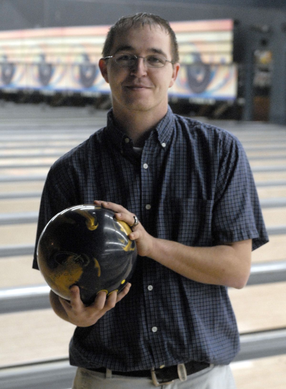 Fleck recently bowled a 300 game at Big Daddy’s, despite the lingering pain from his tuberculosis. (J. Rayniak / The Spokesman-Review)