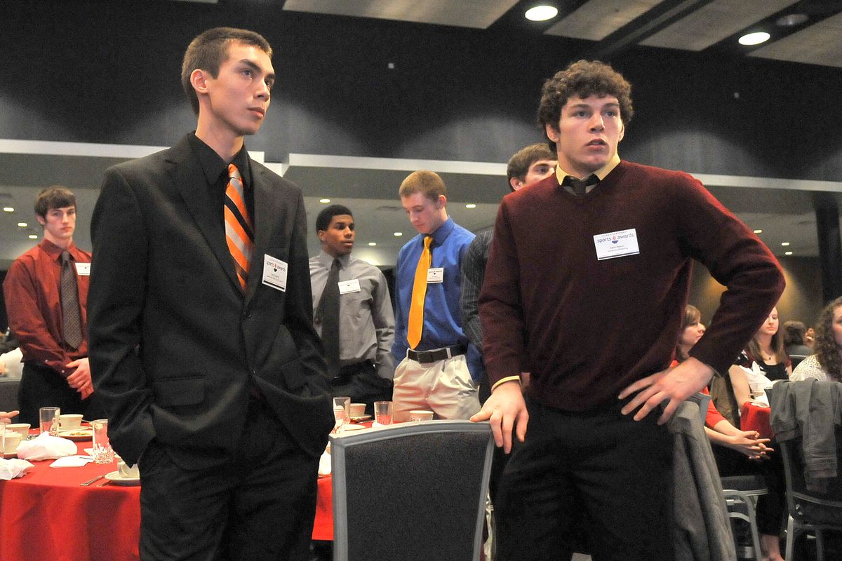 Kenji Bierig, center left, and Jake Mason, right, wait with other nominees to hear who will be named Junior Male Athlete of the Year at the annual Inland Northwest Sports Awards banquet on Wednesday, Feb. 16, 2011,  at the Spokane Convention Center. Moments later, the winner was Bishop Sankey, seen behind, just to the right of Bierig. (Jesse Tinsley / The Spokesman-Review)