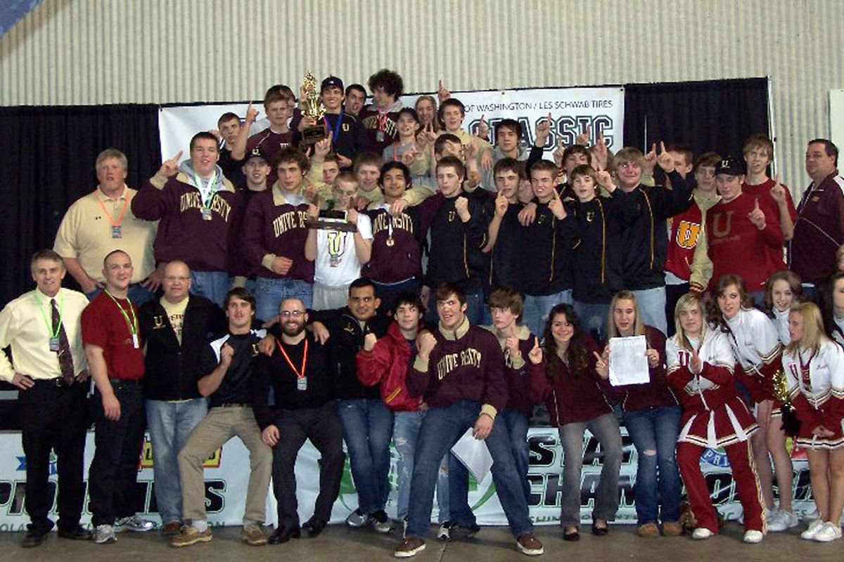 University High School celebrates its state wrestling championship in Tacoma last week. (COURTESY PHOTO)