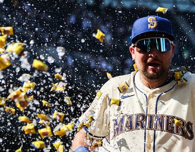 Seattle Mariners catcher Cal Raleigh reacts to having gum and ice thrown on him after a game against the Athletics on Sunday at T-Mobile Park in Seattle.  (Getty Images)