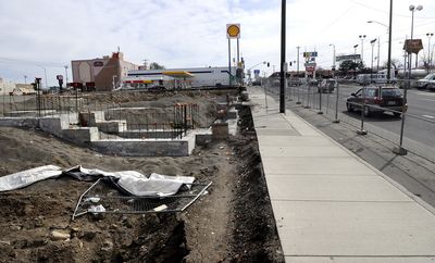 Construction has stalled on the site of the Peppertree Inn on the corner of Third Avenue and Division Street in Spokane.  (Dan Pelle / The Spokesman-Review)