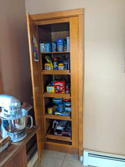 This is just a small pantry, right? Or do all the shelves roll out and rotate to the right, revealing access to a tiny room behind the wall? Use your imagination.  (Tribune Content Agency)