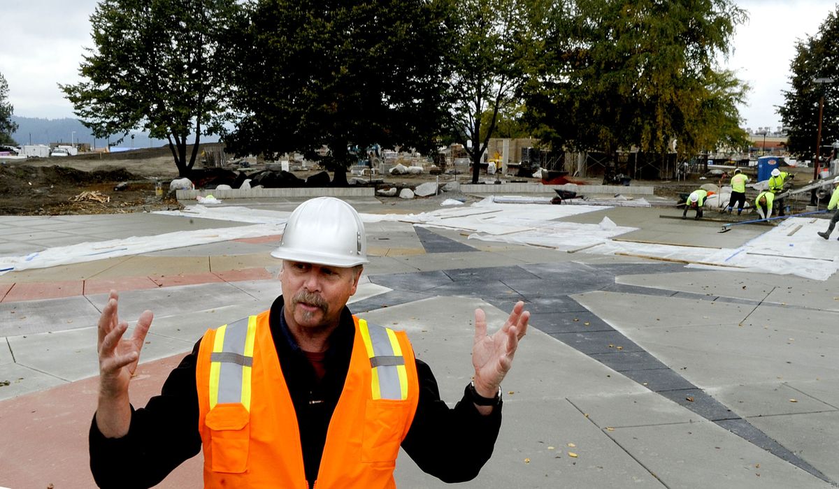 Coeur d’Alene interim parks director Bill Greenwood leads a media tour of the progress of McEuen Park construction on Thursday. About 80 percent of the project is financed through an urban renewal district. The new park won’t open until late next spring. (Kathy Plonka)
