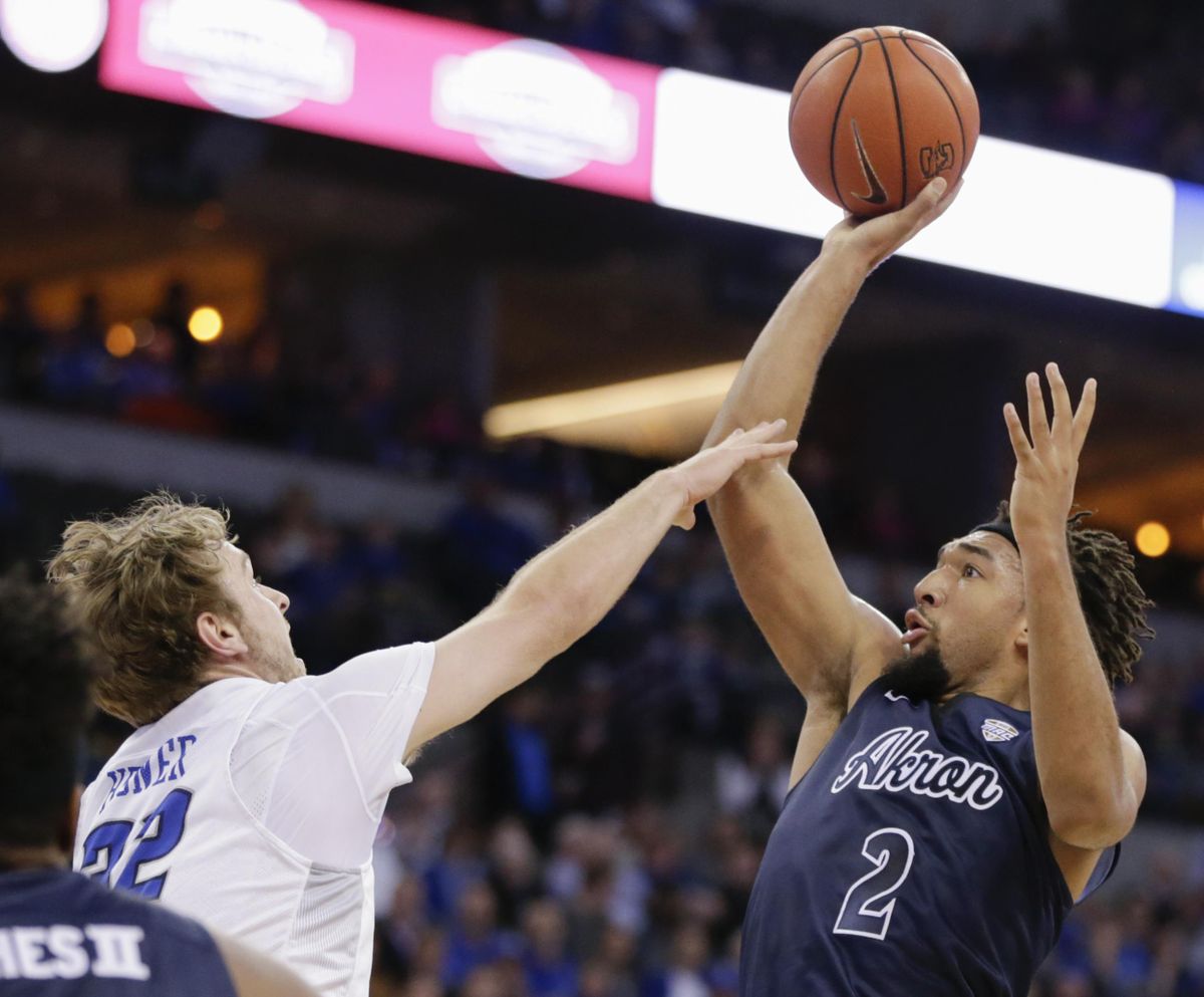 Akron’s Kwan Cheatham Jr. (2) shoots over Creighton’s Toby Hegner (32) during the first half of an NCAA college basketball game in Omaha, Neb., Saturday, Dec. 3, 2016. (Nati Harnik / Associated Press)