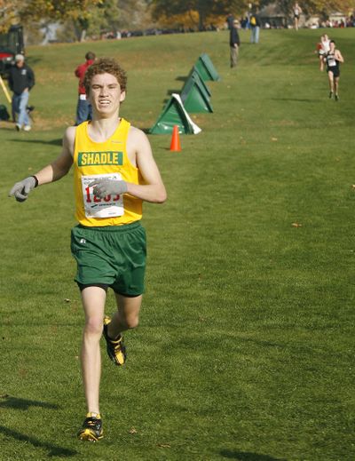 Nathan Weitz of Shadle Park wins the boys 3A competition comfortably with a time of 15:12. (Kai-Huei Yau)
