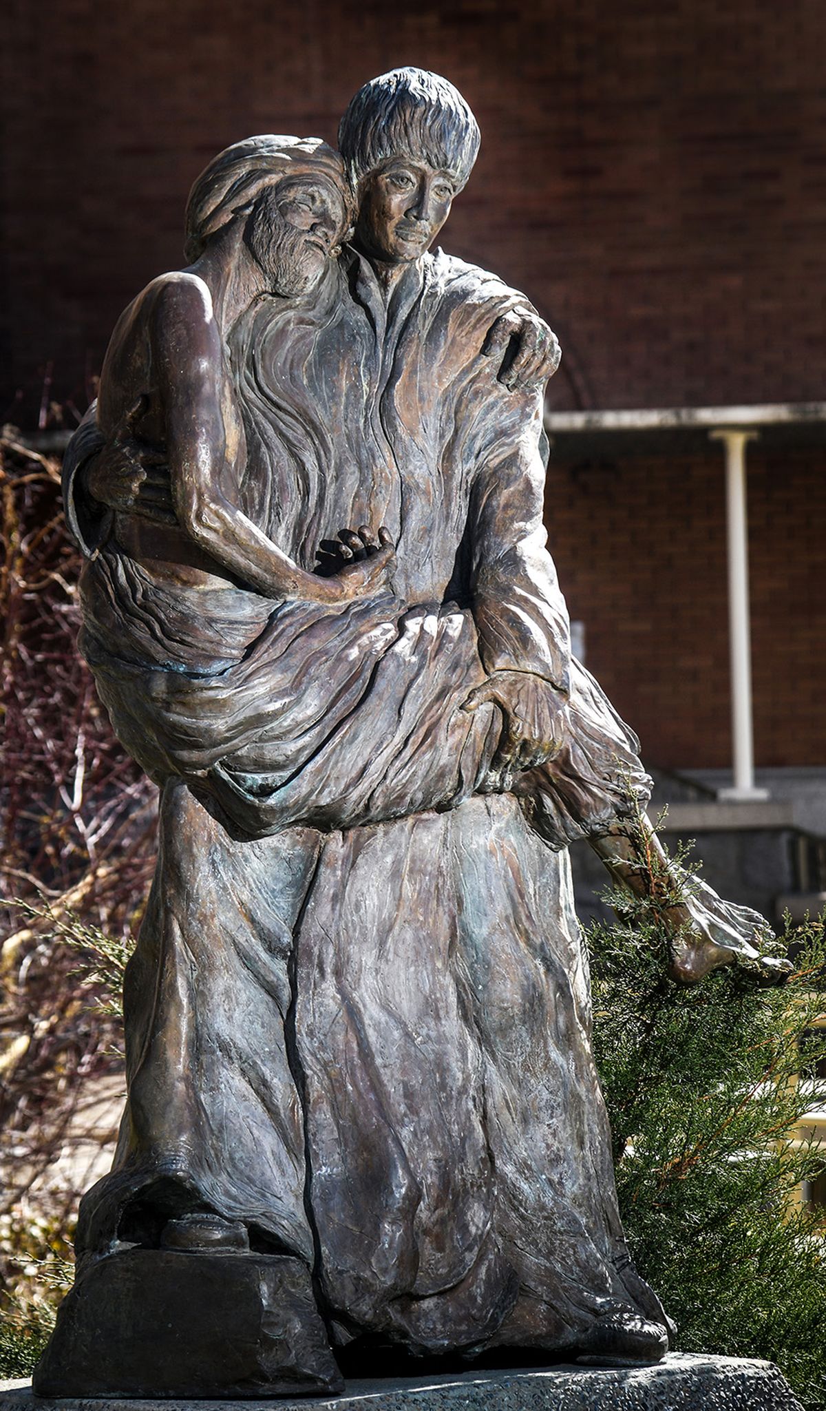 The Saint Aloysius Gonzaga statue outside the front entrance to St. Aloysius Church on the GU campus in Spokane. The plaque at the statue