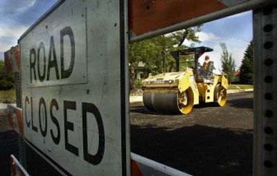 
A roller works the construction site on North Ash on Friday afternoon. 
 (Christopher Anderson/ / The Spokesman-Review)