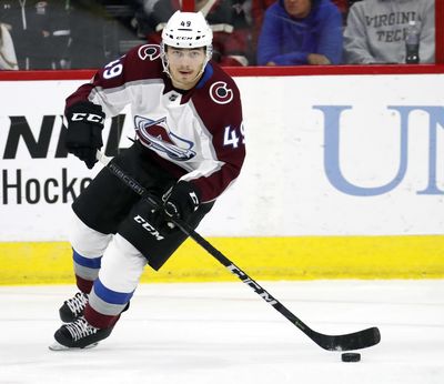 In this Oct. 20, 2018 photo, Colorado Avalanche’s Samuel Girard (49) moves the puck during the first period an NHL hockey game in Raleigh, N.C. The Avalanche locked up defenseman Samuel Girard, Wednesday, July 31, 2019, with a seven-year extension that runs through the 2026-27 season. (Chris Seward / Associated Press)