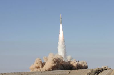 This image released Wednesday,  taken at an undisclosed location in Iran, shows a missile test fire. Associated Press/Fars News Agency (Associated Press/Fars News Agency / The Spokesman-Review)
