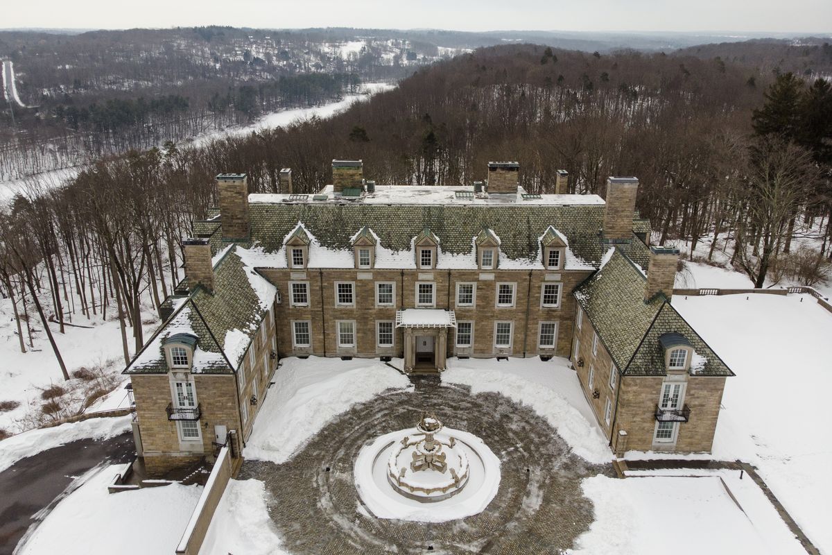 The Seven Springs, a property owned by former U.S. President Donald Trump, is covered in snow, Tuesday, Feb. 23, 2021, in Mount Kisco, N.Y. The estate, a 213-acre swath of nature surrounding a Georgian-style mansion, is a subject of two state investigations in New York: a criminal probe by Manhattan District Attorney Cyrus Vance Jr. and a civil inquiry by state Attorney General Letitia James. Both investigations focus on whether Trump manipulated the property’s value to reap greater tax benefits from an environmental conservation arrangement he made while running for president in 2016.  (John Minchillo)