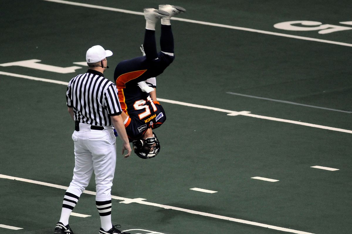 Spokane Shock Raul Vijil executes a back flip to celebrate his TD in the second quarter against Tri-Cities, April 11, 2009 in the Spokane Arena.  (DAN PELLE)