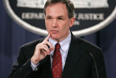 
Special Counsel Patrick J. Fitzgerald pauses during a news conference Friday at the Justice Department following the indictment of I. Lewis 