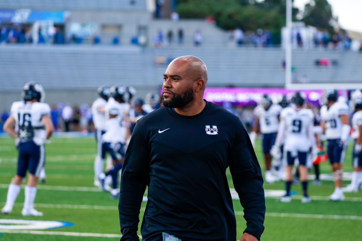 Utah State cornerbacks coach Ray Brown walks the sideline before a game earlier this season. Washington State will reportedly hire Brown to fill the same position at the Pullman school, where he began his Division I coaching career in 2013.  (Utah State Athletics)