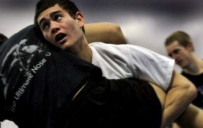 Jake Norris of Coeur d’Alene High School during wrestling practice Monday.  He will compete in the state-qualifying 5A Region I tournament this weekend at Lakeland High School. He’s ranked second in the state. (Kathy Plonka / The Spokesman-Review)