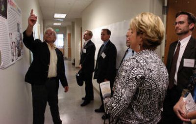 
Dr. Larry Branen, left, guides a tour of the University of Idaho Research Park to members of the Governor's Science and Technology Advisory Council on Tuesday in Post Falls. 
 (Dan Pelle / The Spokesman-Review)