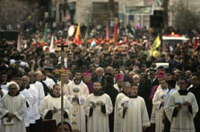 
The procession to the Church of the Nativity, believed by many to be the birthplace of Jesus, took place Monday in Bethlehem. Associated Press
 (Associated Press / The Spokesman-Review)