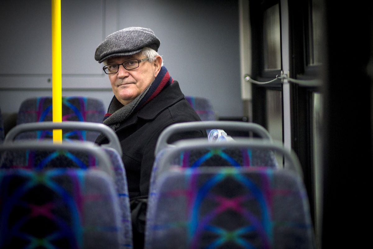 By bus: EWU professor Dennis Anderson has been commuting to his job in Cheney five days a week for the past 1 0 years. (Colin Mulvany)