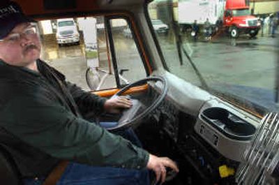 
David Newsom, a driver from Central Freighting in Spokane, prepares to drive the course at the Truck Driving Championships on Saturday at Jensen Distribution. 
 (Jed Conklin / The Spokesman-Review)