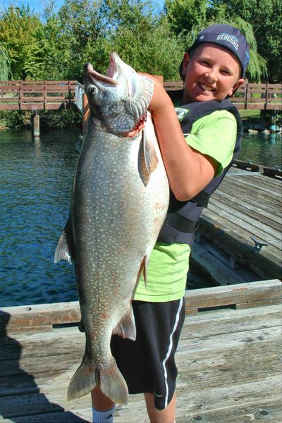 Sam Arnott, 11, of Mill Creek, Wash., with a lake trout he caught at Lake Chelan with Darrell and Dad's Family Guide Service. (Darrell & Dad's Family Guide Service)