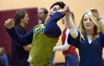 
Eastern Washington University students Ashley Harris and Palmer Aguirre dance in a swing class on campus Thursday afternoon. Harris is using a Guaranteed Education Tuition account to help pay for school.
 (Holly Pickett / The Spokesman-Review)