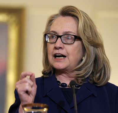 Secretary of State Hillary Rodham Clinton speaks sparingly about the situation in Algeria at the State Department in Washington on Friday. (Associated Press)