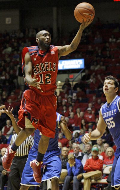 Mississippi’s Chris Warren lays it in for two of his 22 points. (Associated Press)