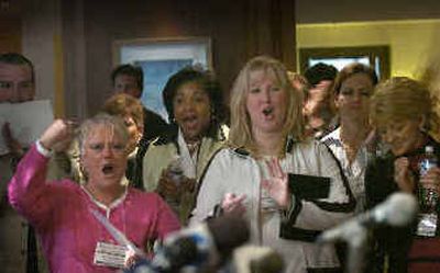 
Flight attendants cheer after the Association of Flight Attendants board said Tuesday it would hold votes to authorize strikes at four major airlines.Flight attendants cheer after the Association of Flight Attendants board said Tuesday it would hold votes to authorize strikes at four major airlines.
 (Associated Press / The Spokesman-Review)