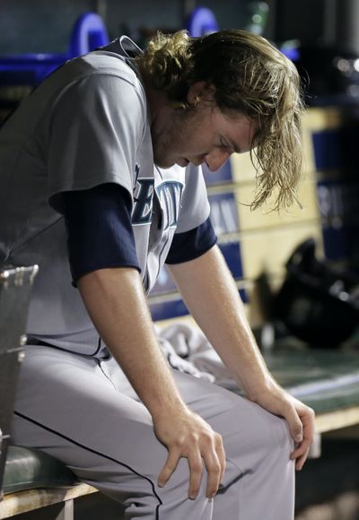 M’s reliever Brandon Maurer gave up two runs on four hits. (Associated Press)