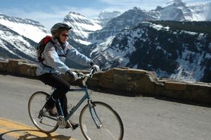 A cyclist  descends Going-to-the-Sun Road in Glacier National Park. Sixty-seven  percent of those polled said they’d go to another state on their vacation; 19 percent said they will travel outside the U.S. Photo courtesy of Becky Lomax (Photo courtesy of Becky Lomax / The Spokesman-Review)