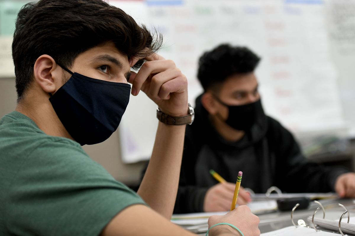 Nawaz Amani, from Afghanistan, listens to instruction during a February English language class at Ferris High School.  (Kathy Plonka/The Spokesman-Review)
